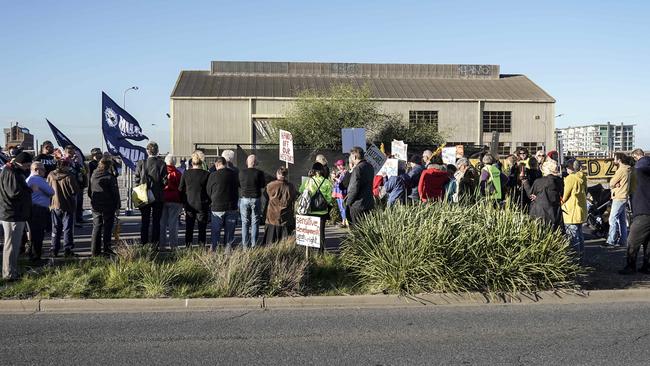 Protesters in a last-ditch effort to save Shed 26 on Tuesday, May 7. Photo: AAP Mike Burton. 