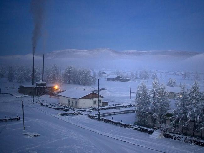 Oymakon village at dawn with a plume of smoke rising from the heating plant Village of Oymyakon. Picture: Amos Chapple/REX/Shutterstock/Australscope