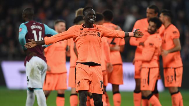 Sadio Mane of Liverpool celebrates after making the assist of his sides fourth goal.