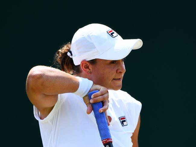 LONDON, ENGLAND - JULY 07:  Ashleigh Barty of Australia reacts against Daria Kasatkina of Russia duirng their Ladies' Singles third round match on day six of the Wimbledon Lawn Tennis Championships at All England Lawn Tennis and Croquet Club on July 7, 2018 in London, England.  (Photo by Clive Mason/Getty Images)