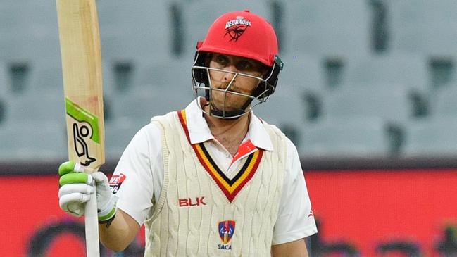 South Australian skipper Jake Lehmann acknowledges a half century during the   Sheffield Shield match between South Australia and New South Wales at Adelaide Oval. Picture: AAP Image/David Mariuz.