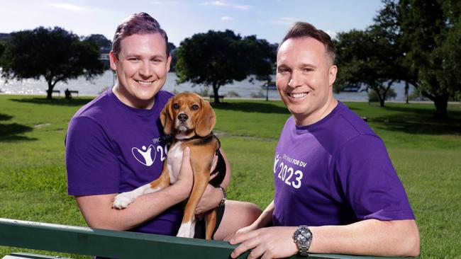 Brendan Smith and Brendon Mann with their dog Hamilton. Picture: Steve Pohlner