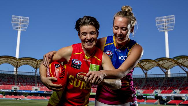 Suns Sam Virgo and Lions Lauren Arnell at Metricon Stadium, Picture: Jerad Williams