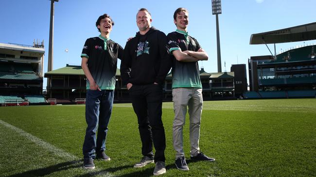 Guinevere Capital’s Dave Harris with e-sports team members Brandon Alexander and Nathan Mott at the SCG. Picture: Jane Dempster
