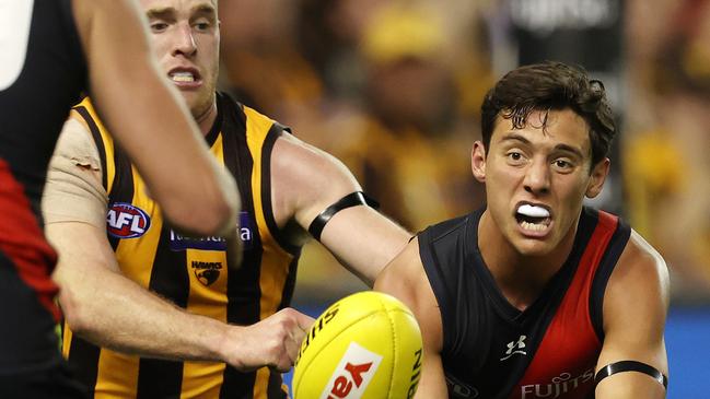 Jye Caldwell fires off a handball against Hawthorn in Round 1, 2021. Picture: Michael Klein