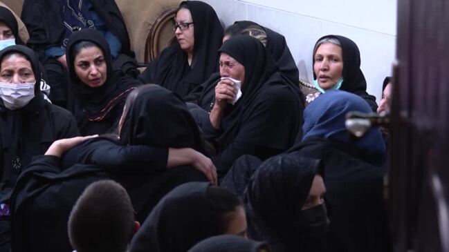 Relatives mourn family killed in Iran shrine attack thumbnail