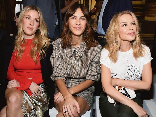 Alexa Chung sitting front row with Ellie Goulding and Kylie Minogue at Stella McCartney’s spring/summer 2018 show in Paris. Picture: Getty Images