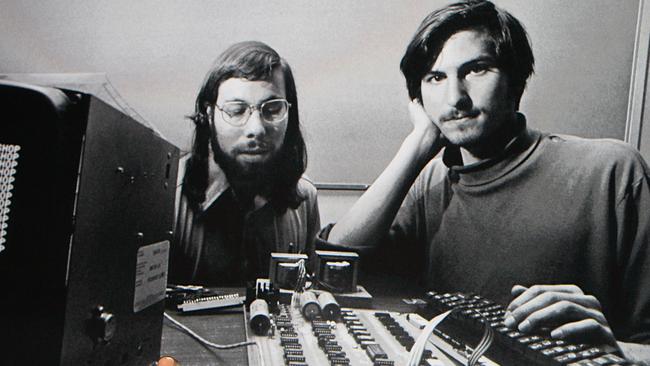 Apple Inc CEO Steve Jobs speaks during an Apple Special Event at Yerba Buena Centre for the Arts in San Francisco, California, 27/01/2010 before an image of himself and Steve Wozniak who met in high school, who founded Apple in 1976. Apple introduced its latest creation, the iPad, a mobile tablet browsing device that is a cross between the iPhone and a MacBook laptop.