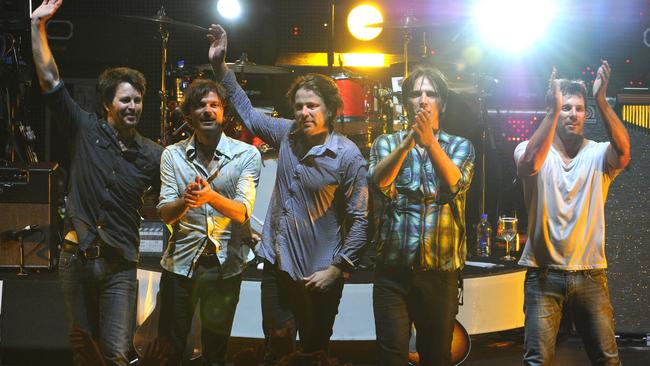 Powderfinger bid farewell after final performance together in 2010. Picture: Dave Hunt/AAP