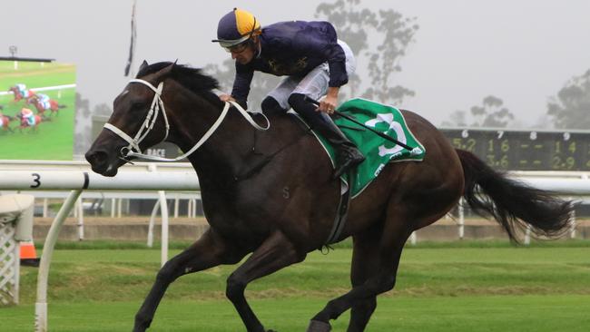 Black Queen gets out to her right distance and handles wet ground. Picture: Grant Guy