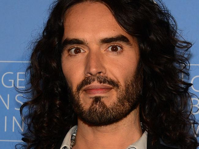 (FILES) Actor Russell Brand poses on arrival with director David Lynch (not pictured) to launch âMeditation in Educationâ, a Global Outreach campaign to teach 1,000,000 at-risk youth "Meditation in Education" on April 2, 2013 in Los Angeles, California. British comedian and actor Russell Brand has been accused by an unnamed actress of sexually assaulting her during the filming of the film "Arthur" in 2010 in New York, according to court documents revealed on November 3, 2023. (Photo by Frederic J. BROWN / AFP)