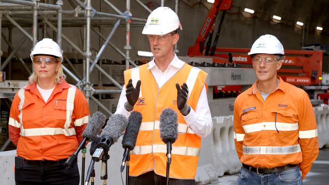 Transport and Main Roads Minister Mark Bailey, with L to R, Kat Stapleton CEO Queensland Rail with Graeme Newton the CEO CRR. Photo: Steve Pohlner