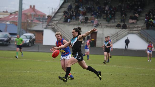 Thor Boscott in Cygnet's recent grand final victory over Huonville. Photo courtesy of CMW Photography.