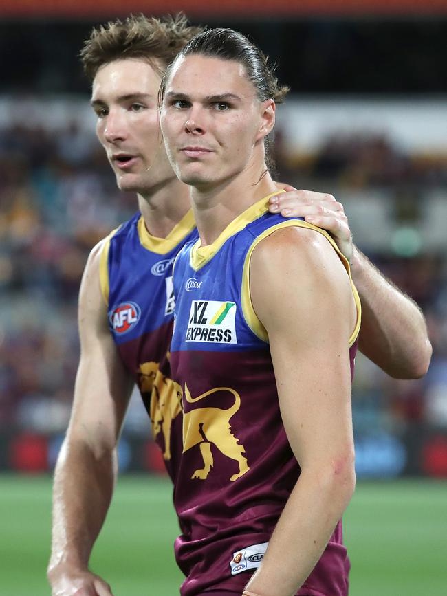 Premiership players Harris Andrews (left) and Eric Hipwood are two of the great success stories of the Lions Academy. (Photo by Jono Searle/AFL Photos/via Getty Images)