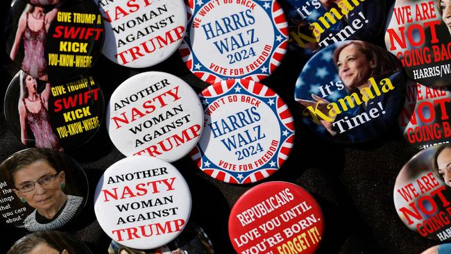 Campaign buttons are sold as supporters of US Vice President and Democratic presidential candidate Kamala Harris arrive for campaign rally. Picture: AFP)