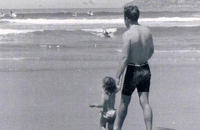 Vicky O'Keefe with her dad Johnny at Freshwater Beach in 1962. Picture: Vicky O'Keefe