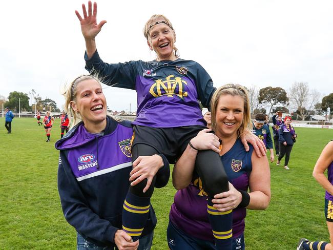 Lynn Smith chaired off the field in her last Masters game in 2018.