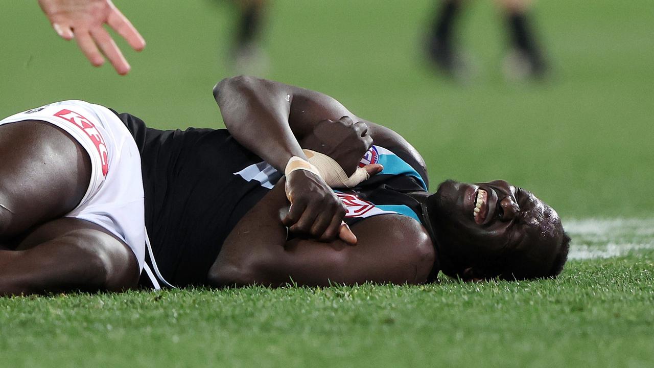 Aliir Aliir was in obvious distress. Photo by Sarah Reed/AFL Photos via Getty Images.