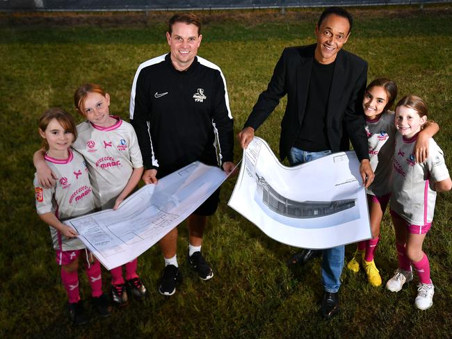 General manager Magic United Andrew Robinson and Gold Coast councillor Bob La Castra with players Briella Bird, Khloe Madsen, Zara Pinto and Chloe Pike. Magic United are delighted to announce the construction of additional changing facilities to accommodate the growing number of female players and teams at the Club. Wednesday June 5, 2024. Picture, John Gass