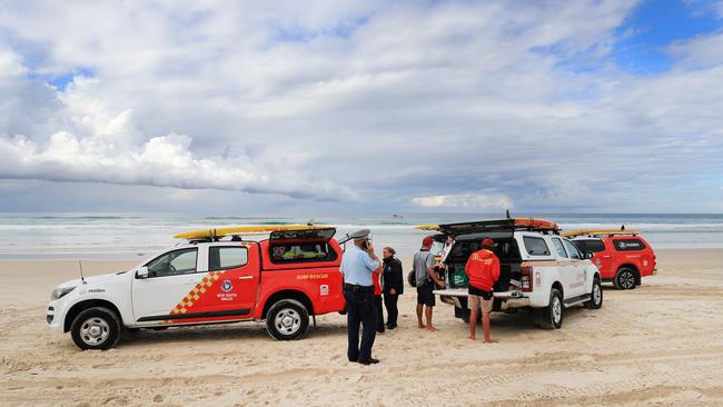 Police and surf crews at the scene. Picture: Scott Powick