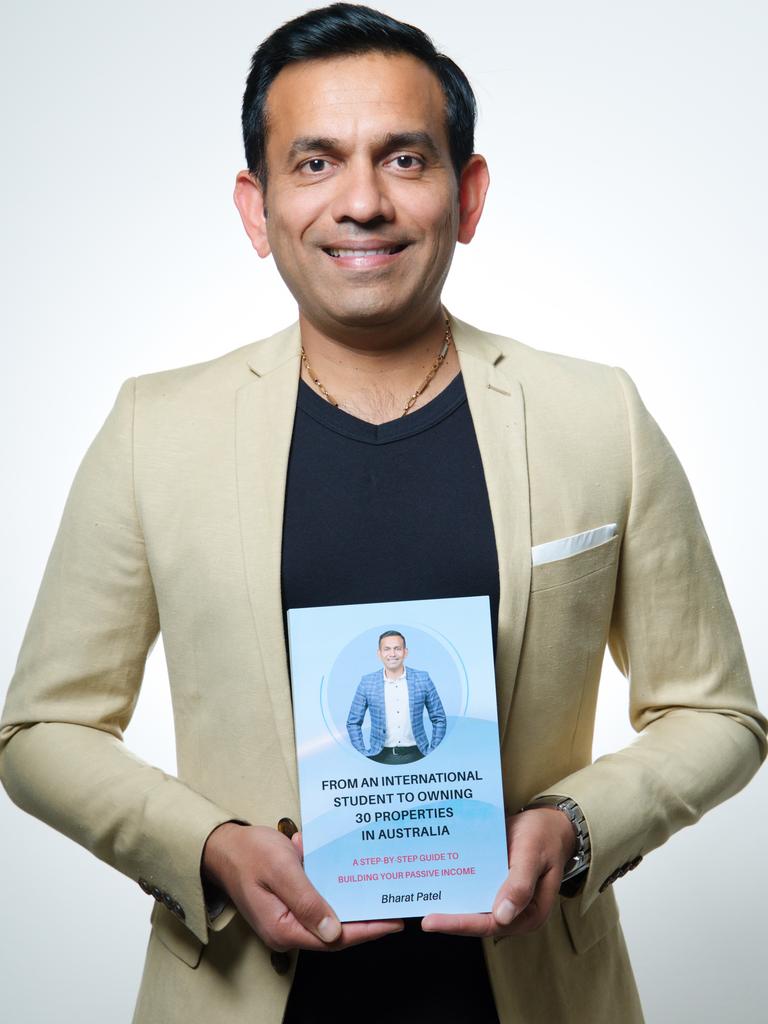 Bharat Patel with his first book designed to inspire people on low income that it is possible to crack the market.