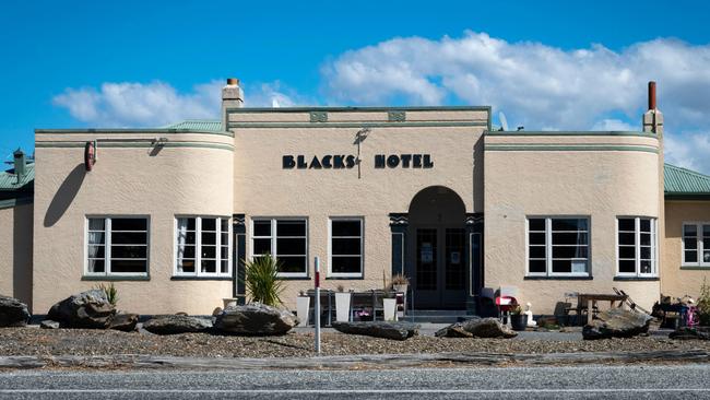 We bond over travel stories and pints of Dark Horse at Blacks Hotel in the former gold-mining settlement of Ophir.