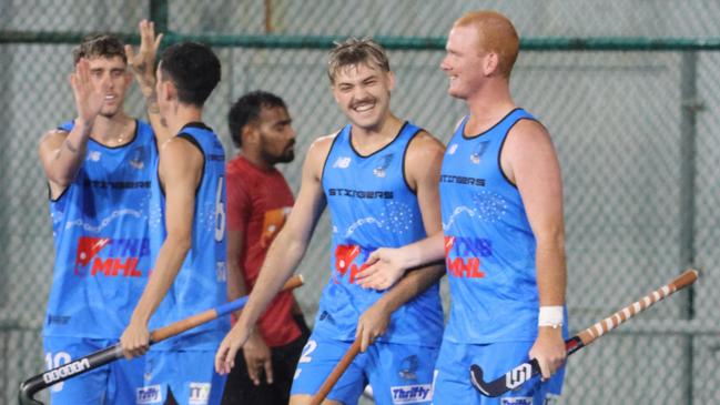 Luke Broadway (second from right) celebrates a goal for the Territory Stingers. Picture: Hockey NT / Territory Stingers