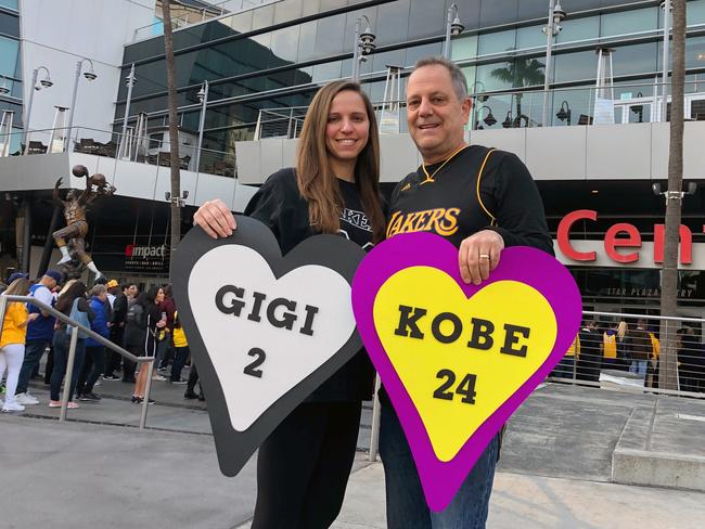 Alyssa Shapiro, 27, of Huntington Beach, and her father Rick Shapiro, 55, outside Staples Center in Los Angeles. Picture: AP