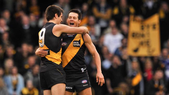 Ben Cousins with a young Trent Cotchin in 2010.