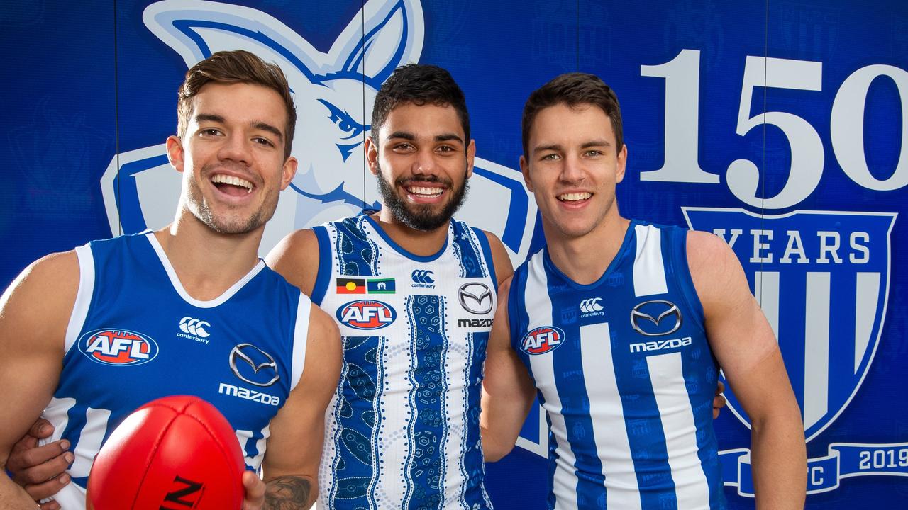 North Melbourne young guns Jy Simpkin, Tarryn Thomas and Luke Davies-Uniacke. Picture: Jay Town