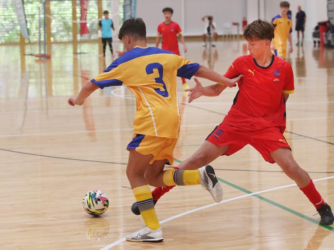 National Futsal Championships 2024 at Carrara. South Australia (red) V ACT U/13 boys. Picture Glenn Hampson