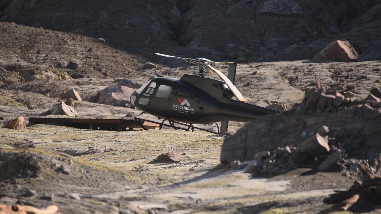 An abandoned helicopter on White Island, New Zealand. Picture: Geoff Mackley/GWN