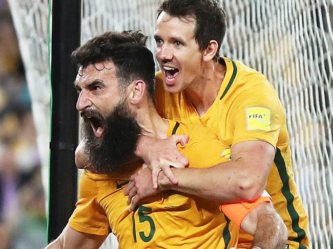 SYDNEY, AUSTRALIA - NOVEMBER 15:  Mile Jedinak of Australia celebrates scoring a goal during the 2018 FIFA World Cup Qualifiers Leg 2 match between the Australian Socceroos and Honduras at ANZ Stadium on November 15, 2017 in Sydney, Australia.  (Photo by Mark Metcalfe/Getty Images)