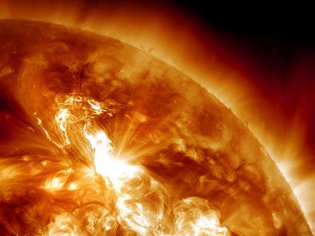 Flare-up ... This 2012 image provided by NASA shows an M9-class solar flare erupting on the Sun's north-eastern hemisphere.