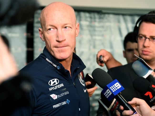 Andrew McKay from the Carlton Blues speaks to waiting media at Etihad stadium during the opening day of the  AFL trade period as club representatives convene to begin trade discussions, in Melbourne, Monday October 9, 2017. (AAP Image/Joe Castro) NO ARCHIVING