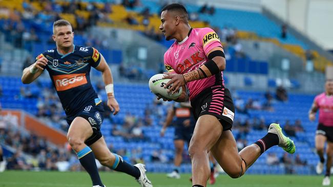 Stephen Crichton of the Panthers scores a try during the round 11 NRL match between the Gold Coast Titans and the Penrith Panthers at Cbus Super Stadium.