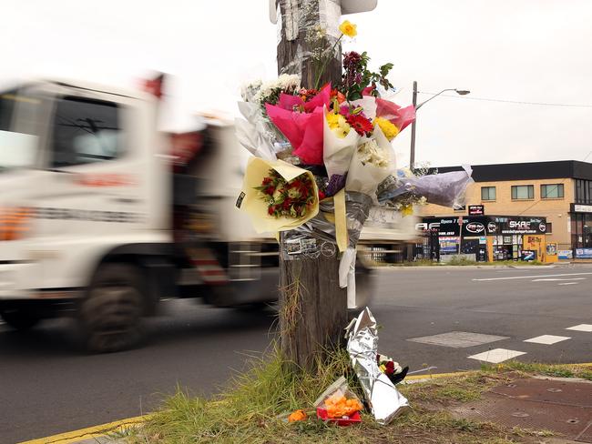 Flowers laid on the side of the road where teenage boy Jason Nguyen was hit and killed by a truck last week. Picture: Sam Ruttyn