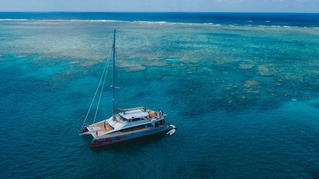 The Passions of Paradise catamaran on the Great Barrier Reef. Picture: TEQ