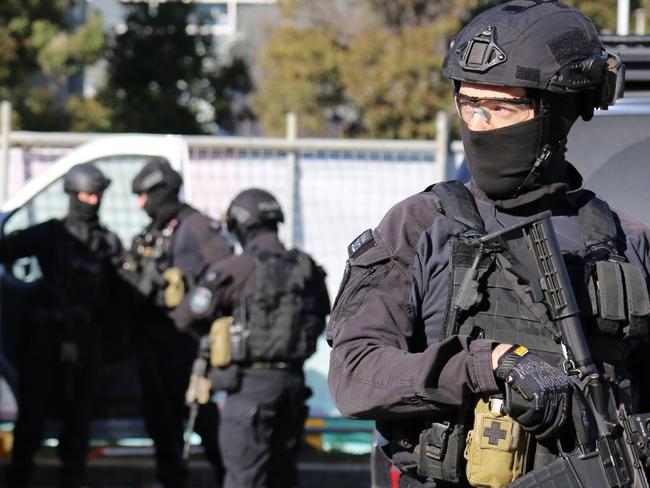 Police at the sceneof one of the raids in Sydney on Tuesday.