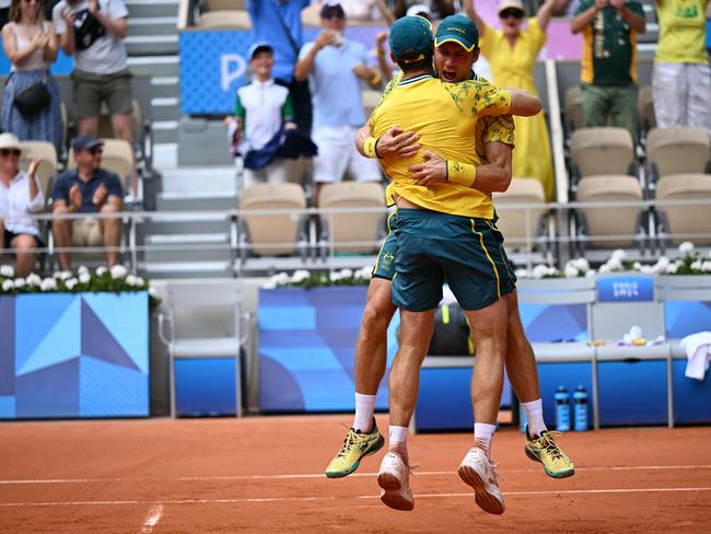 Matthew Ebden (R) and Australia's John Peers (L) celebrated gold on the clay of Roland Garros. Picture: AFP