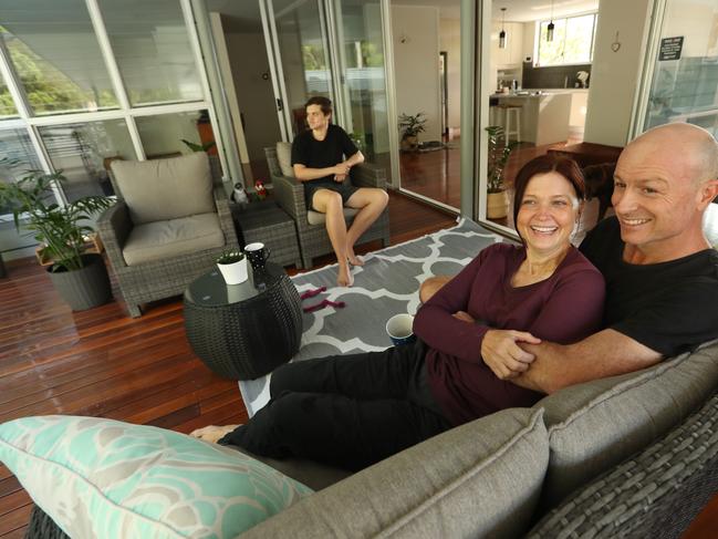 05/7/2019: Cathy Larkins and Matt Smith, and son Zach Larkins, 18 with their dog Hurley, settled on their new home this week in Tarragindi, Brisbane. After looking for a few months in a relatively quite market, Ms Larkins was quick to make $1.2m purchase decision in less than a week .  Lyndon Mechielsen/The Australian