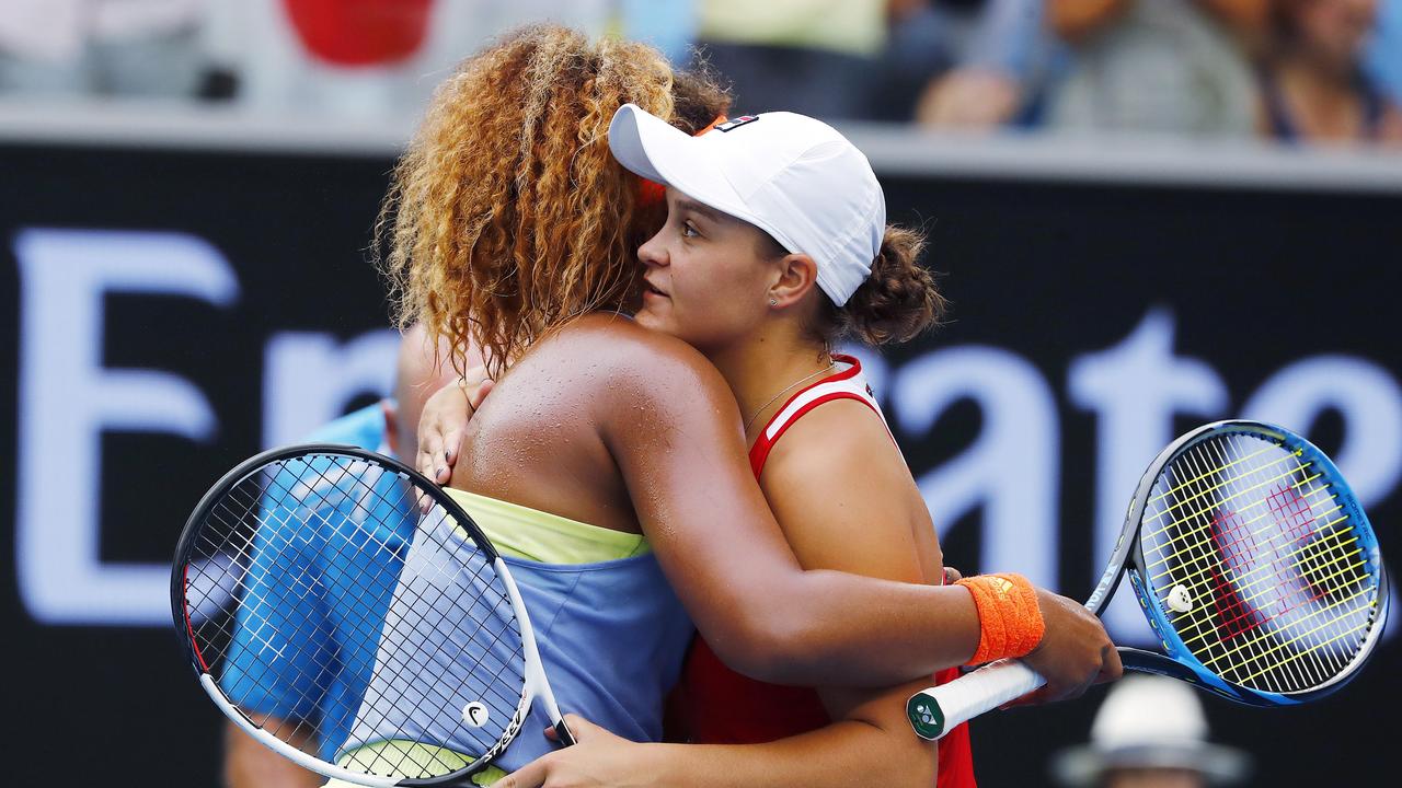 Australian Open Tennis 2018 - Day 6. Ash Barty vs Naomi Osaka. Ash Barty and Naomi Osaka hug at the net after todays match .Pic: Michael Klein