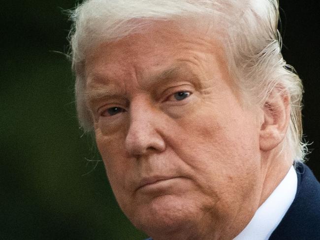 US President Donald Trump walks from Marine One after arriving on the South Lawn of the White House in Washington, DC, October 1, 2020, following campaign events in New Jersey. (Photo by SAUL LOEB / AFP)