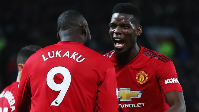 Romelu Lukaku celebrates United’s big win with Paul Pogba.