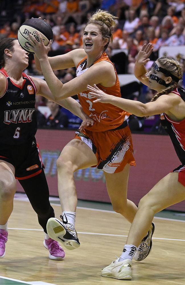 Saffron Shiels of the Fire drives to the basket during the WNBL match between Townsville Fire and Perth Lynx at Townsville Entertainment Centre, on December 31, 2023, in Townsville, Australia. (Photo by Ian Hitchcock/Getty Images)