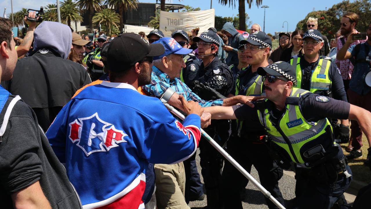 While wearing the Australian flag as items of clothing, right wing supporters of the United Patriots Front scuffled with police. Picture: Matrix