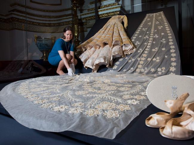 The Queen famously collected coupons for her wedding dress which symbolised a rebirth of the nation in the post-war era. Picture: AFP PHOTO / JUSTIN TALLIS