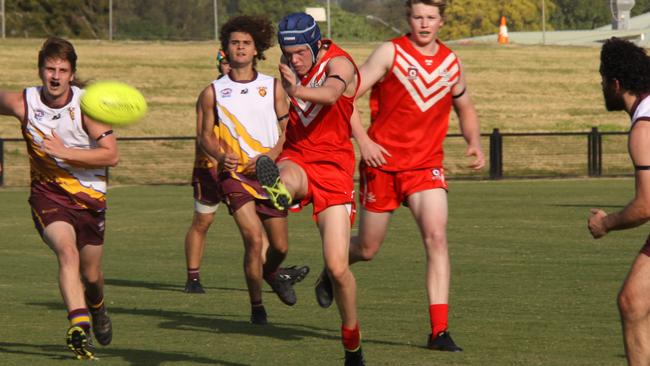 ACTION PACKED: A tough game characterised the Swans vs Lions as Oakes Oval for ANZAC DAY Shield and their first game in the AFL North Coast League. Photo: Alison Paterson