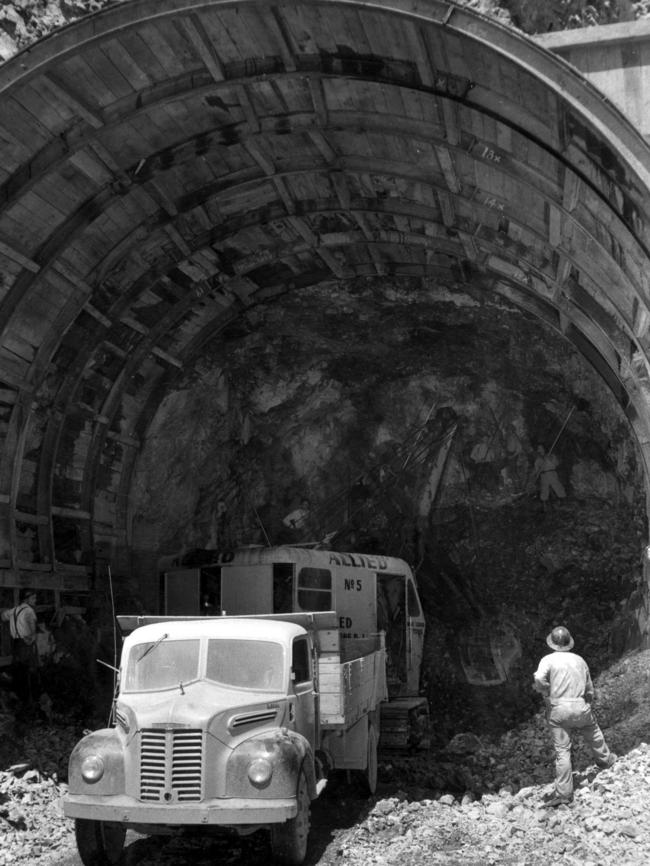 Workers driving a diversion tunnel to carry waters for Eucumbene River while Adaminaby dam was being built during construction of the Snowy River hydro-electric scheme in the 1940s.