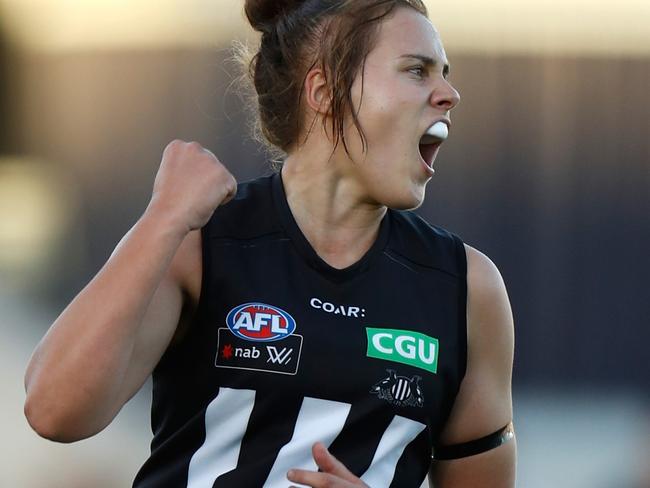 MELBOURNE, AUSTRALIA - FEBRUARY 3: Jasmine Garner of the Magpies celebrates after kicking the first goal during the 2017 AFLW Round 01 match between the Carlton Blues and the Collingwood Magpies at Ikon Park on February 3, 2017 in Melbourne, Australia. (Photo by Michael Willson/AFL Media)